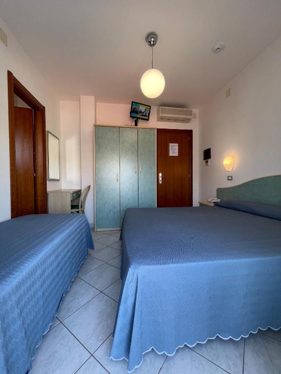Postel nebo postele na pokoji v ubytování Albergo Désirée 2