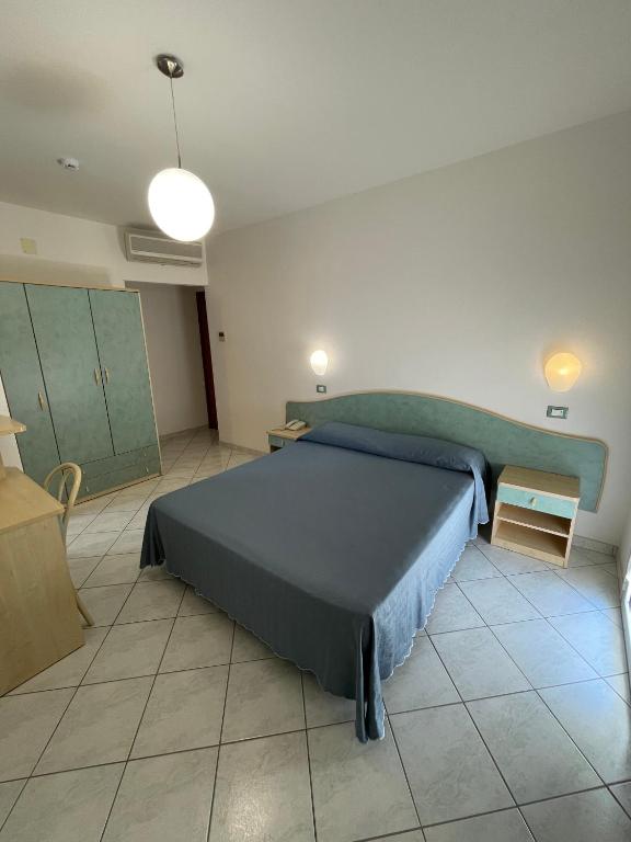 Postel nebo postele na pokoji v ubytování Albergo Désirée 2