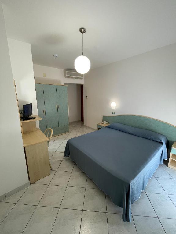 Postel nebo postele na pokoji v ubytování Albergo Désirée 2