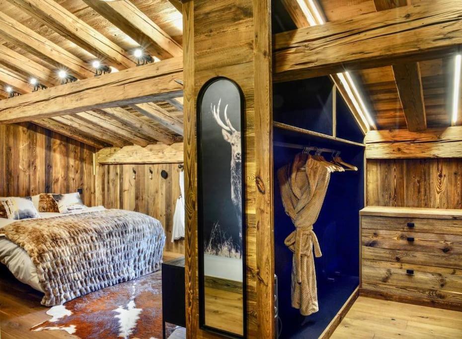 Posteľ alebo postele v izbe v ubytovaní Chalet de luxe sur les pistes - 5 chambres