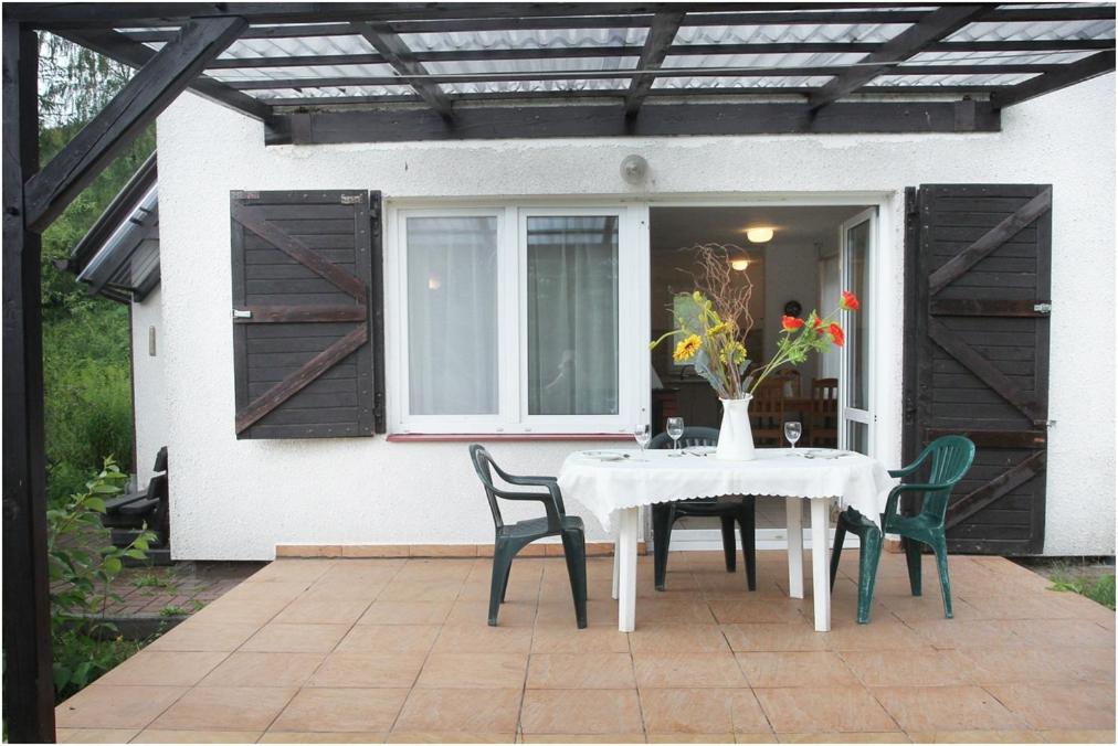 Patio alebo iná vonkajšia časť ubytovania Agroturystyka Lisa Młyn
