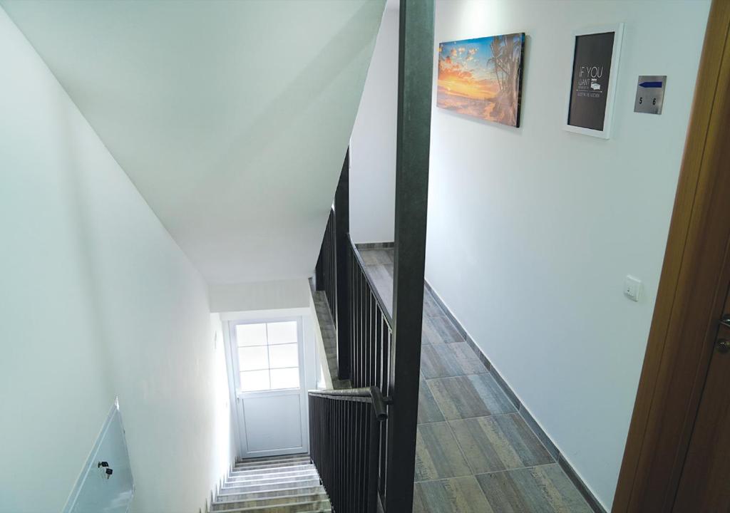 TV a/nebo společenská místnost v ubytování Aster Apartments