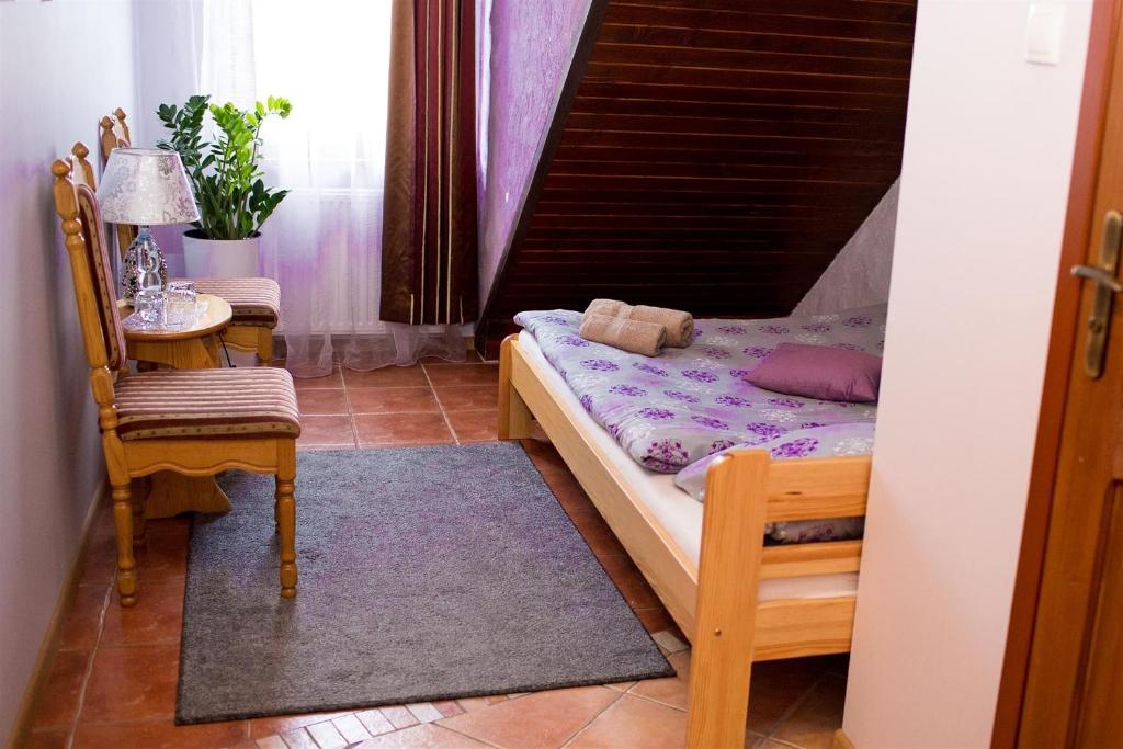Posteľ alebo postele v izbe v ubytovaní Noclegi Abramowicka