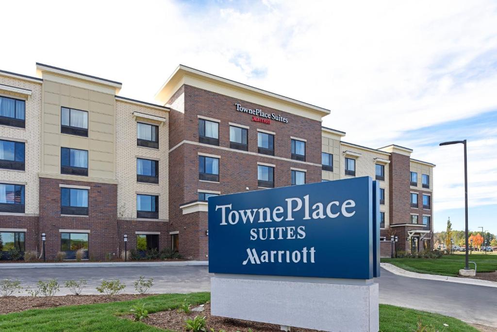 a sign in front of a building at TownePlace Suites by Marriott Detroit Commerce in Walled Lake