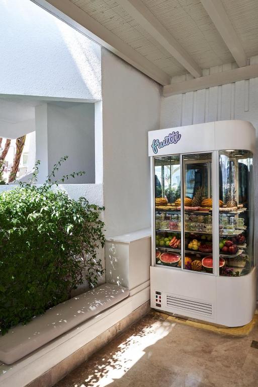 a store with a display case with food in it at Prive Hotel Bodrum - Adult Only in Bodrum City