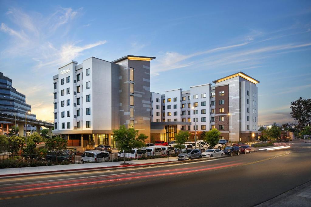 a rendering of a building with cars parked in a parking lot at Residence Inn Walnut Creek in Walnut Creek