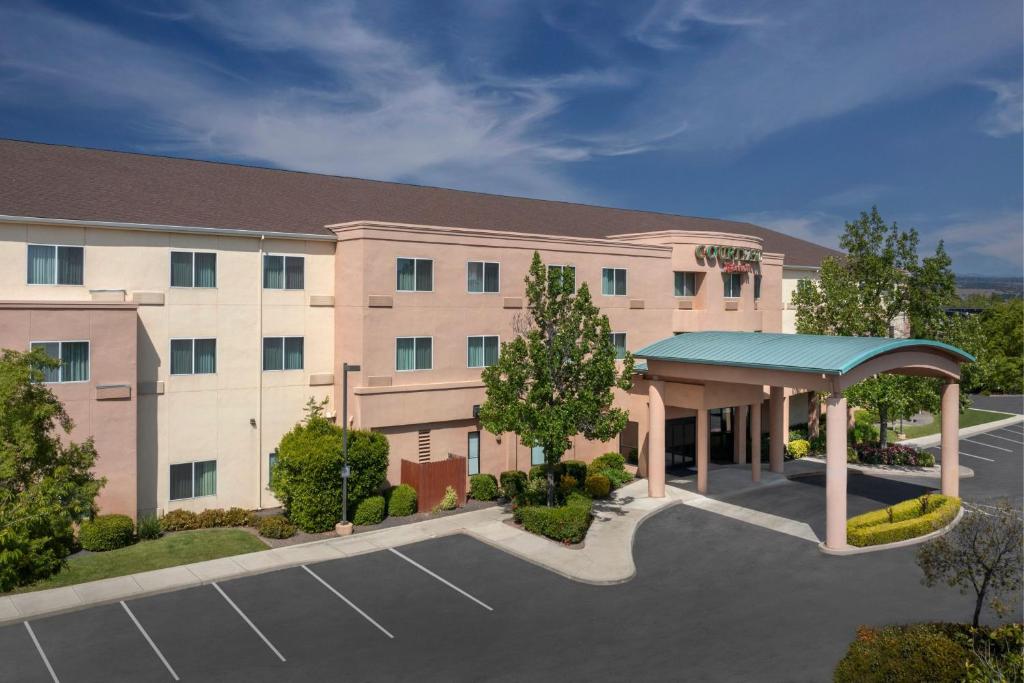 a rendering of a hotel with a parking lot at Courtyard Chico in Chico