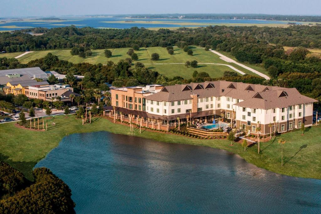 an aerial view of a large house next to the water at Andell Inn in Kiawah Island