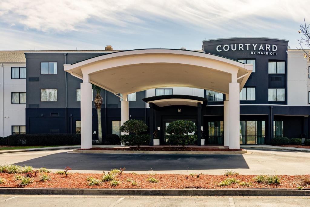 a building with a pavilion in front of a building at Courtyard Brunswick in Brunswick