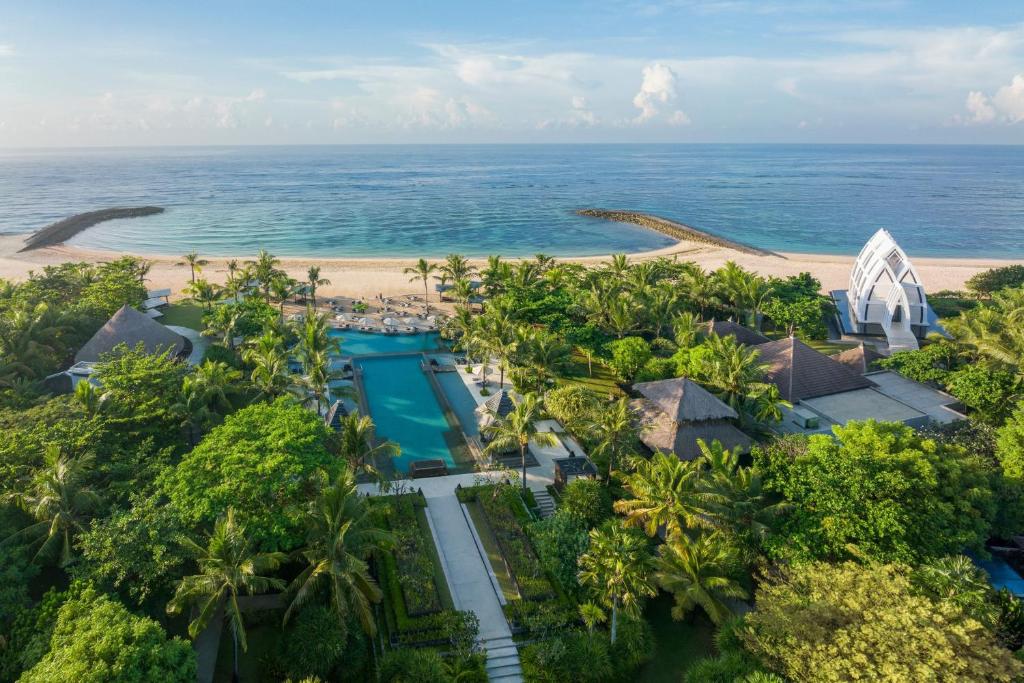 an aerial view of the resort and the ocean at The Ritz-Carlton Bali in Nusa Dua