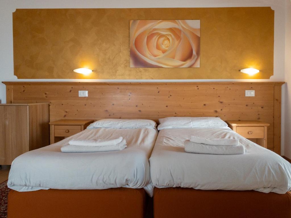 Postel nebo postele na pokoji v ubytování Agritur al Vigneto