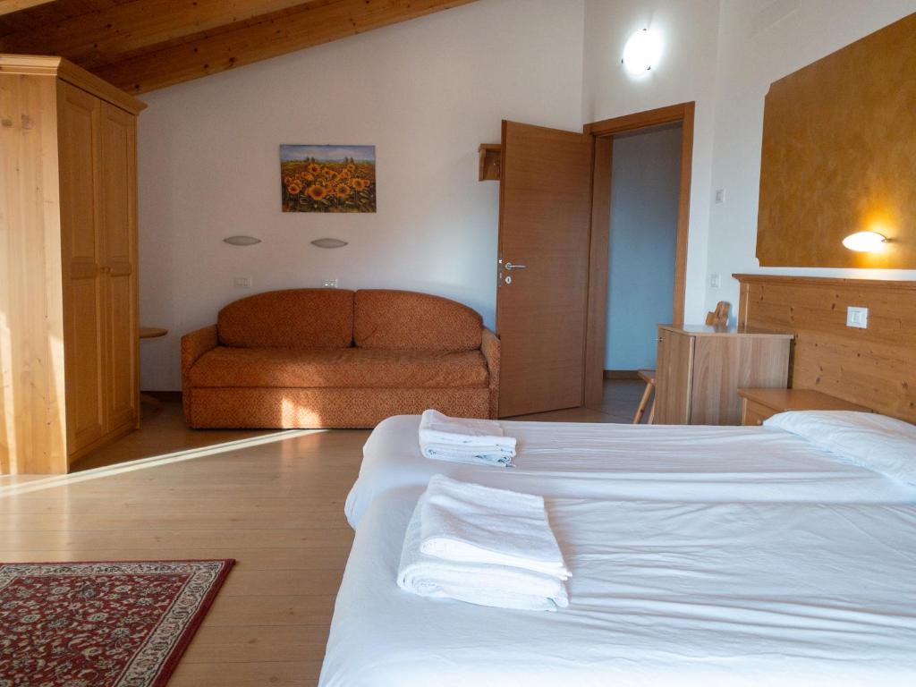 Postel nebo postele na pokoji v ubytování Agritur al Vigneto