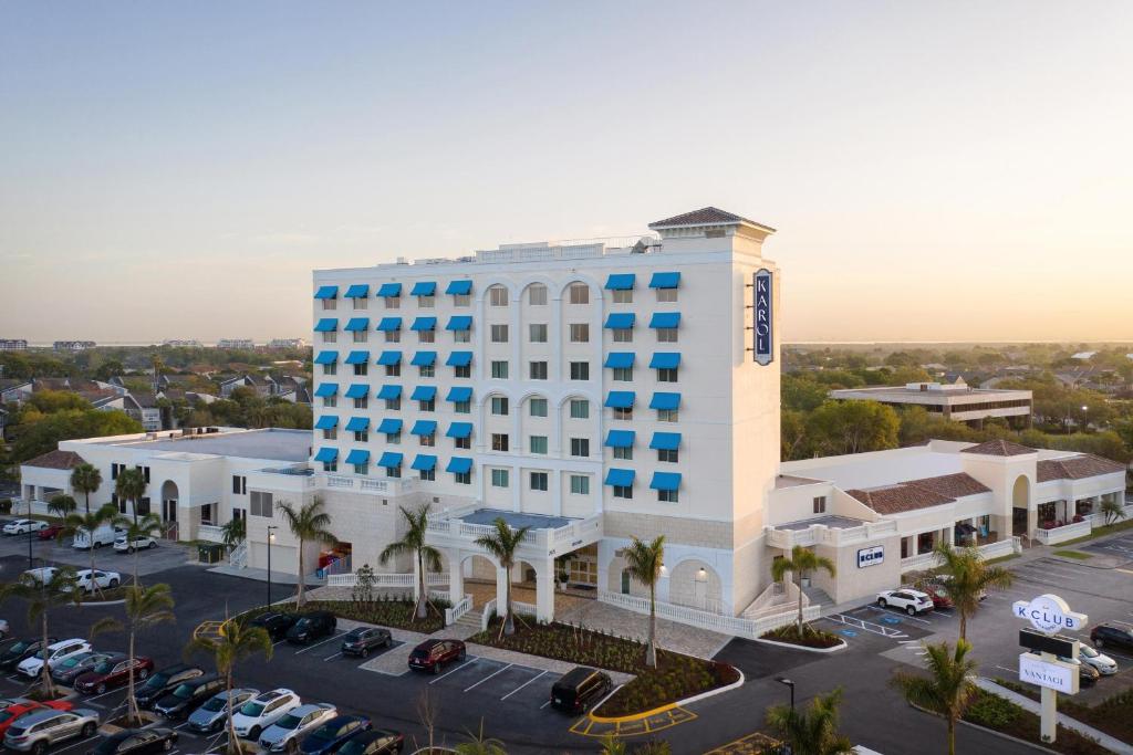 an aerial view of a hotel with a parking lot at The Karol Hotel, St. Petersburg Clearwater, a Tribute Portfolio Hotel in Clearwater