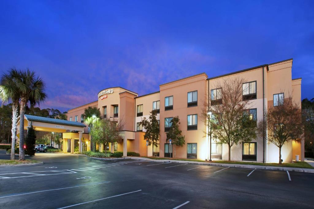 an empty parking lot in front of a hotel at Courtyard by Marriott St. Augustine I-95 in Saint Augustine