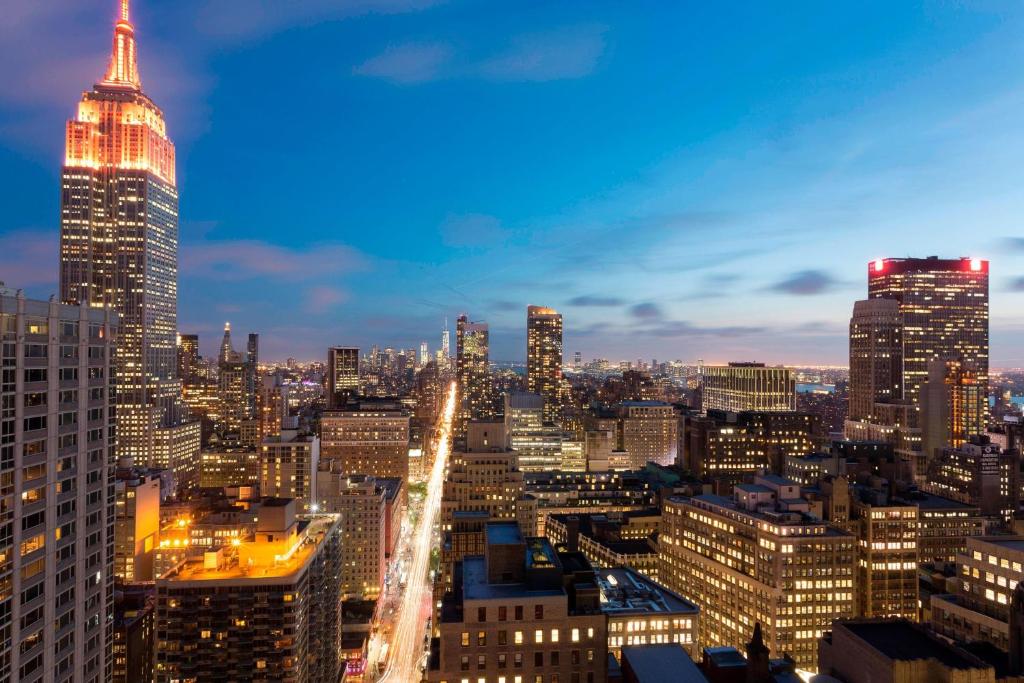 a view of a city skyline at night at Residence Inn by Marriott New York Manhattan/Times Square in New York