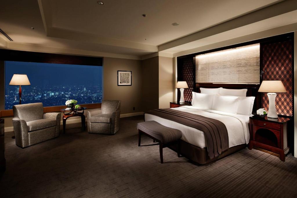 Postel nebo postele na pokoji v ubytování The Ritz-Carlton, Tokyo