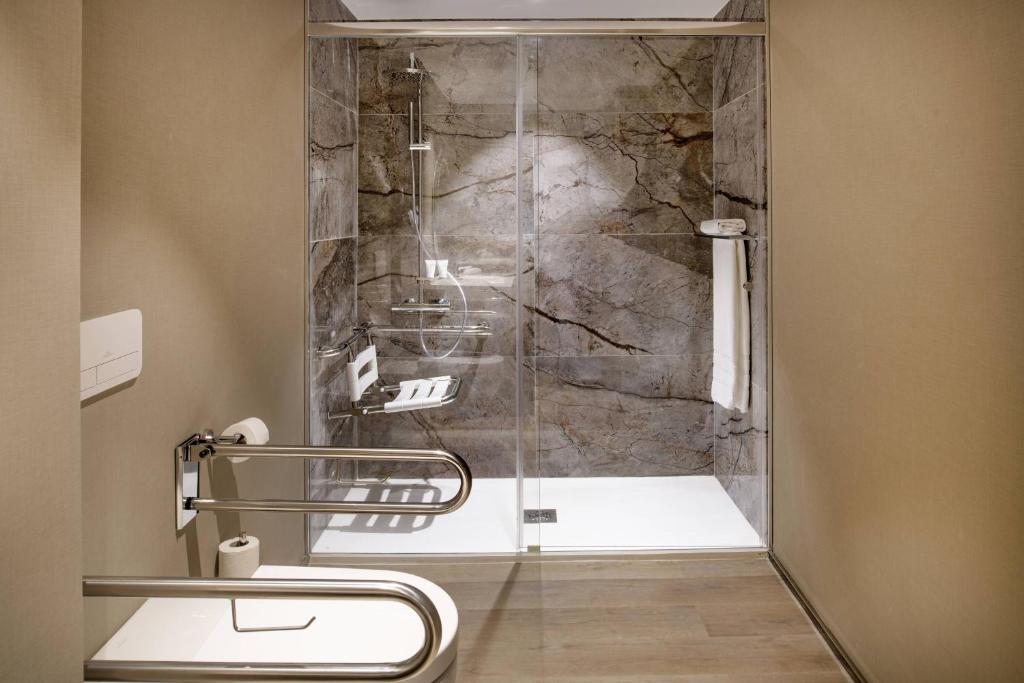 a shower with a glass door in a bathroom at AC Hotel by Marriott Tenerife in Santa Cruz de Tenerife