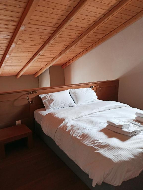 Postel nebo postele na pokoji v ubytování Guesthouse Vasiliki