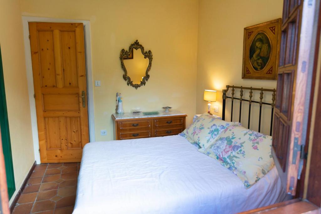 Postel nebo postele na pokoji v ubytování CASA LAXE