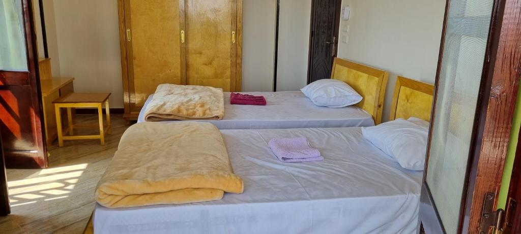 Postel nebo postele na pokoji v ubytování DREAM ISLAND Hotel