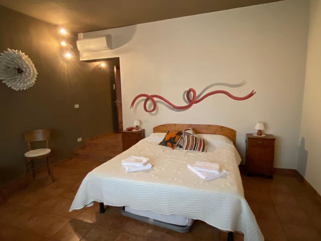 Cama o camas de una habitación en Osteria Locanda Dalla Lina
