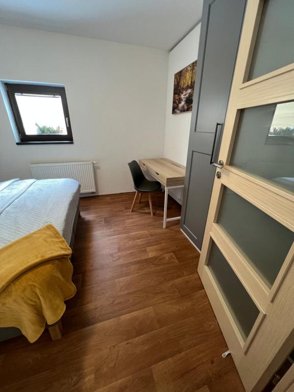 Postel nebo postele na pokoji v ubytování Chalupa U Kříže