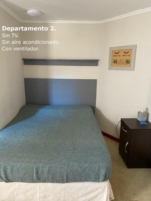 Postel nebo postele na pokoji v ubytování Sarmiento Monoambiente