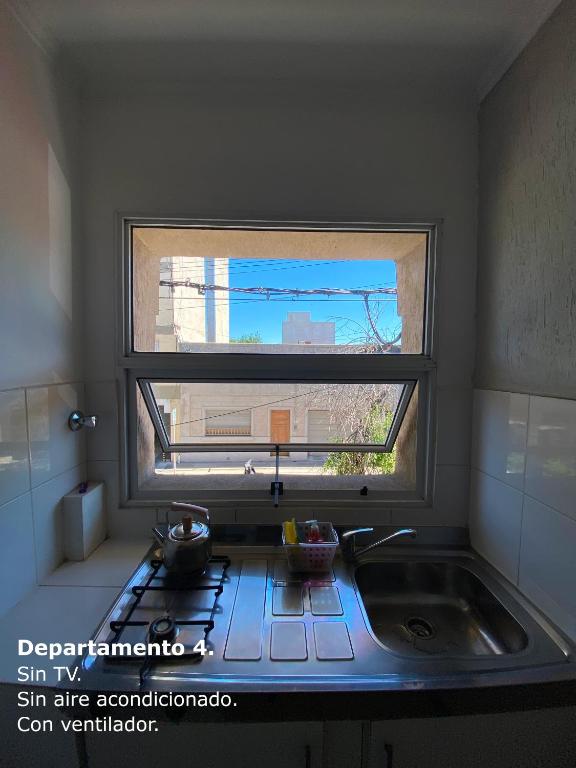 Kuchyň nebo kuchyňský kout v ubytování Sarmiento Monoambiente