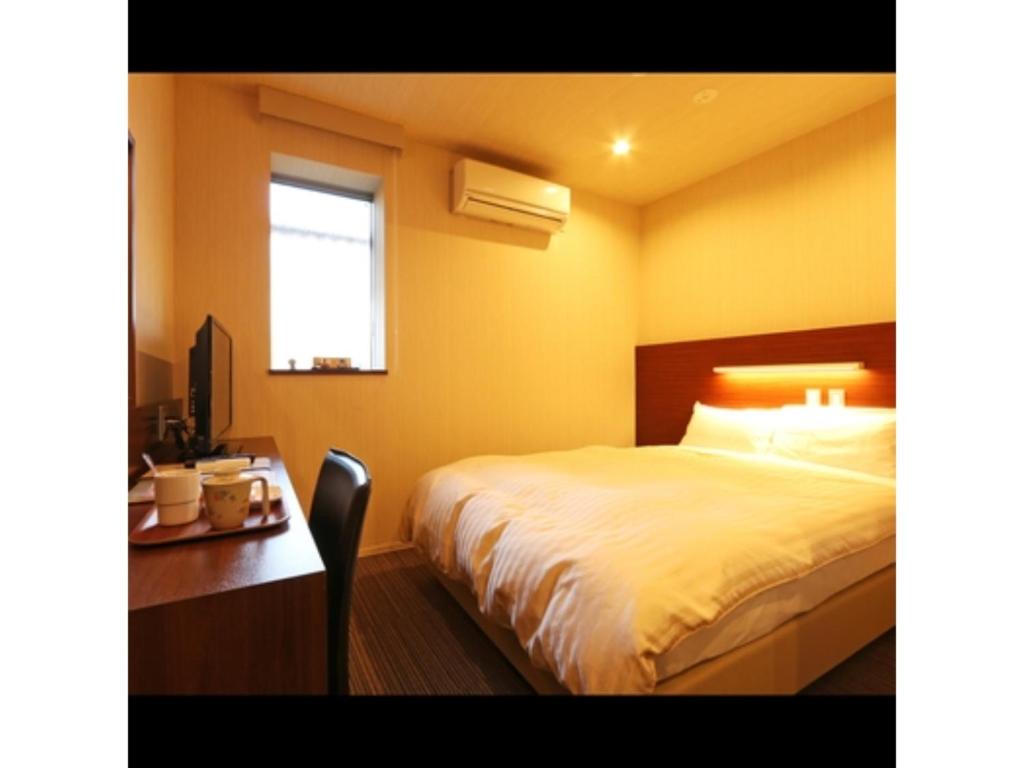 Postel nebo postele na pokoji v ubytování IyashinoYado Akariya - Vacation STAY 74775v