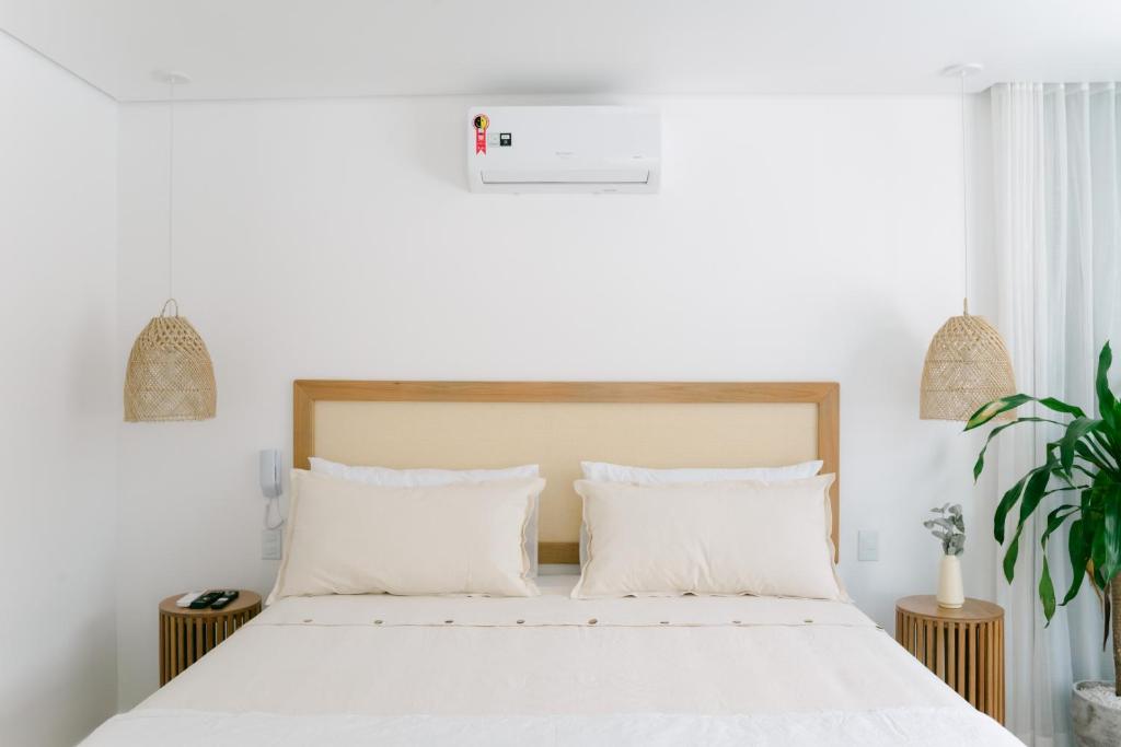 Cama ou camas em um quarto em Olisa Hotel Boutique