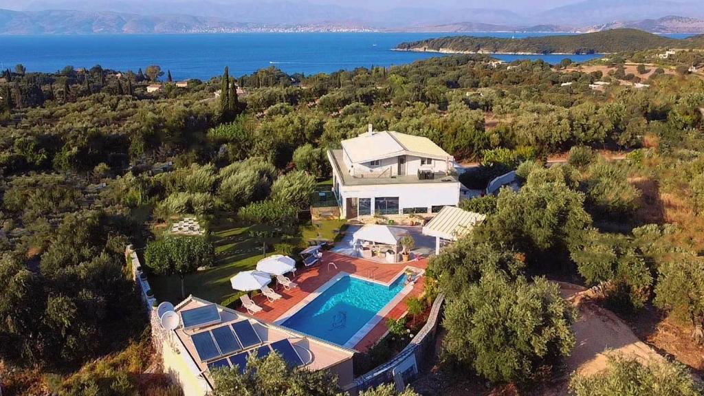 an aerial view of a house with a swimming pool at The Love Villa in Kassiopi