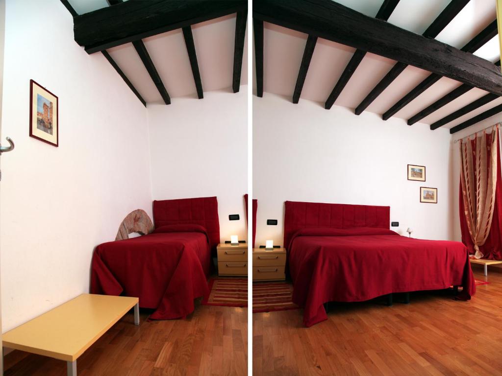 A bed or beds in a room at Il Sipario