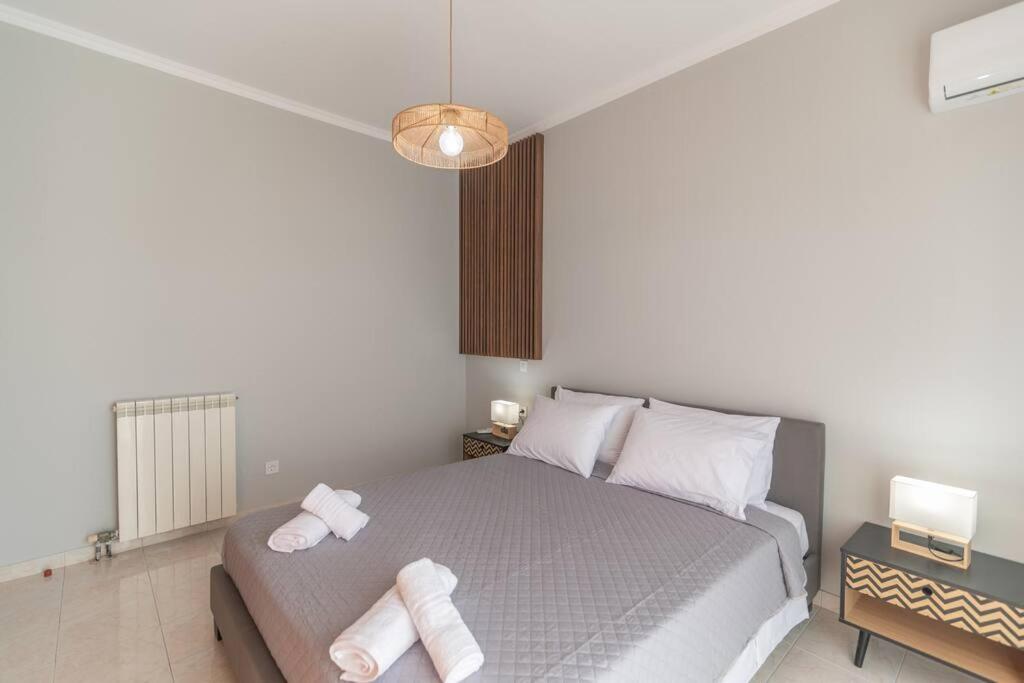 Postel nebo postele na pokoji v ubytování Dion House
