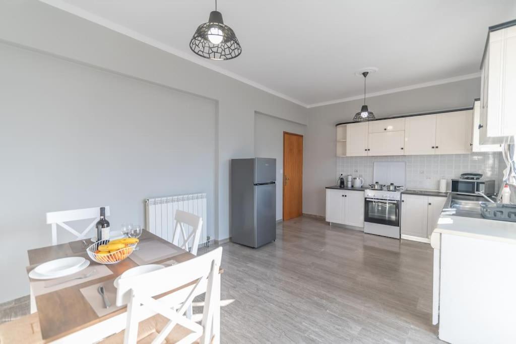 Kuchyň nebo kuchyňský kout v ubytování Dion House