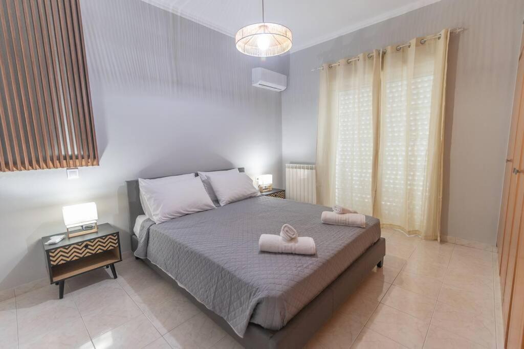 Postel nebo postele na pokoji v ubytování Dion House