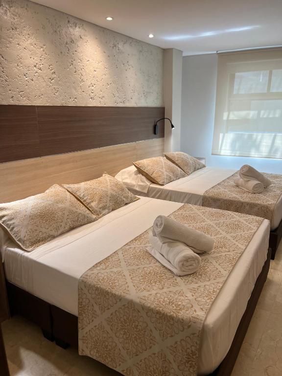 Postel nebo postele na pokoji v ubytování Cartagena Royal Hotel Boutique