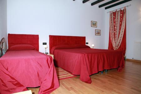 A bed or beds in a room at Il Sipario