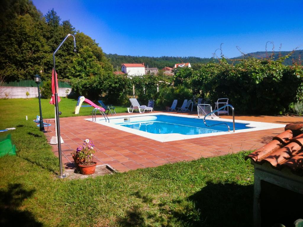 Bazén v ubytování CASA LAXE nebo v jeho okolí