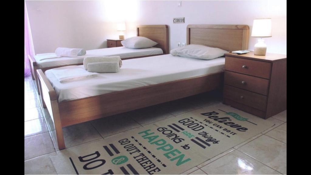 Postel nebo postele na pokoji v ubytování Zenstay Hotel