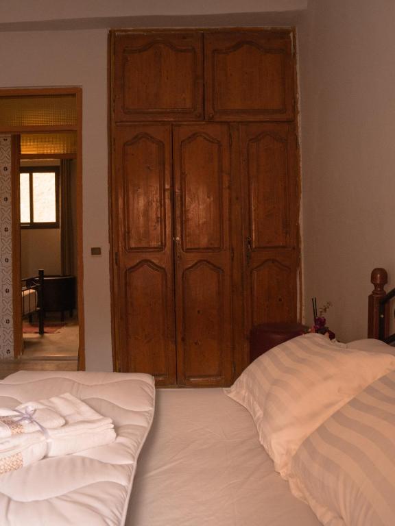 Postel nebo postele na pokoji v ubytování Santacruz Surf Camp Morocco