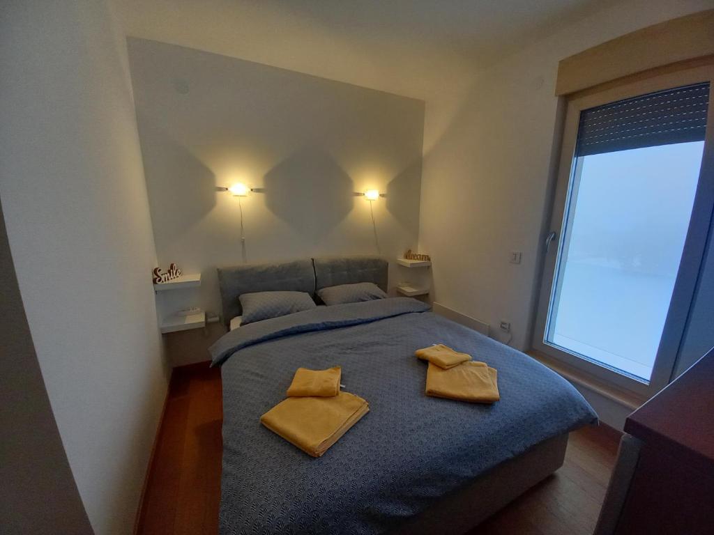 Ein Bett oder Betten in einem Zimmer der Unterkunft Apartman 17 Divcibare