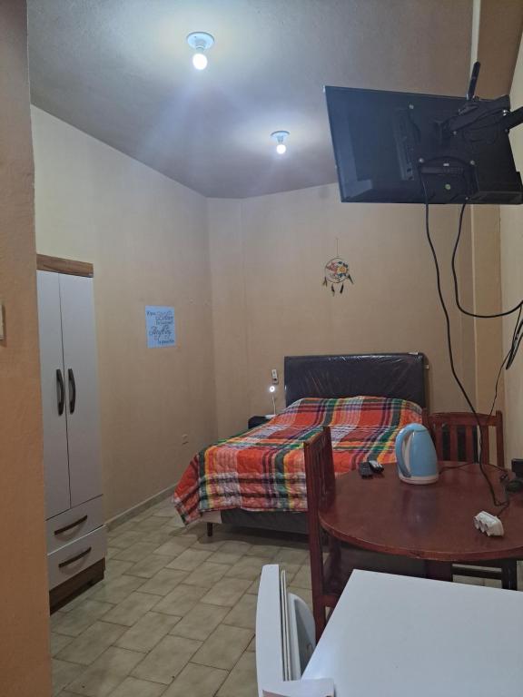 Postel nebo postele na pokoji v ubytování Hummingbird Hostel