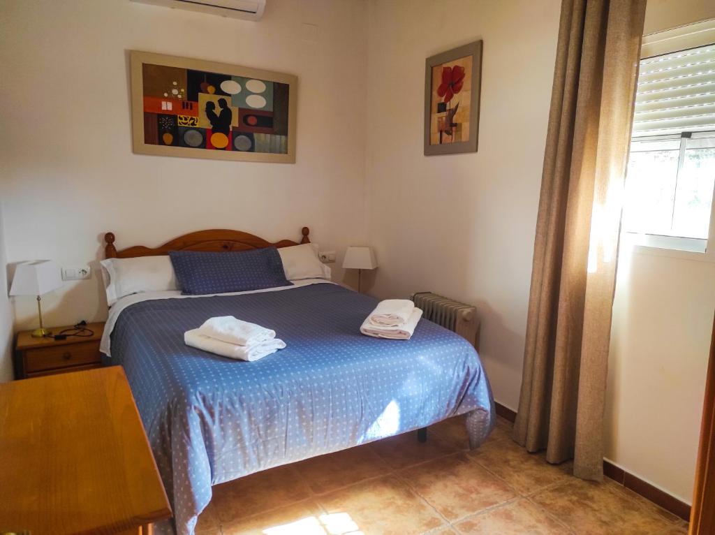 Posteľ alebo postele v izbe v ubytovaní Casa Rural Los Naranjo
