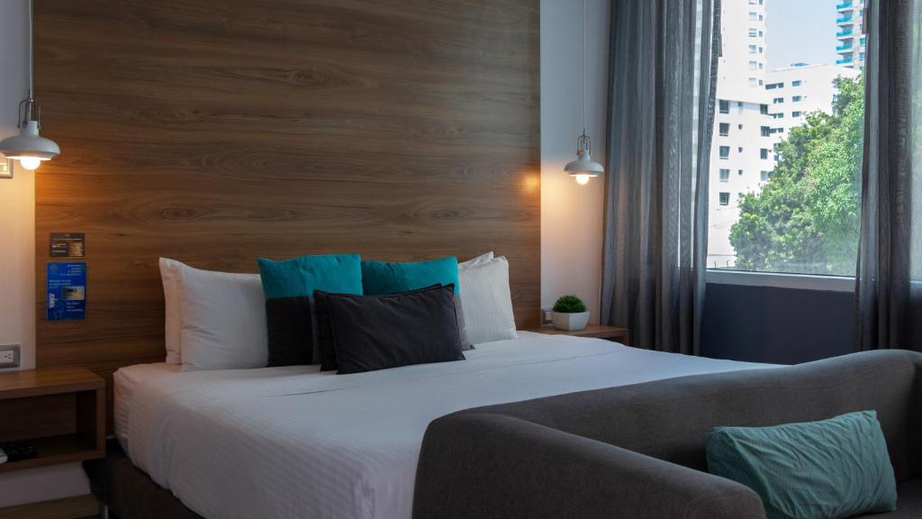 Postel nebo postele na pokoji v ubytování Hotel Blue Concept