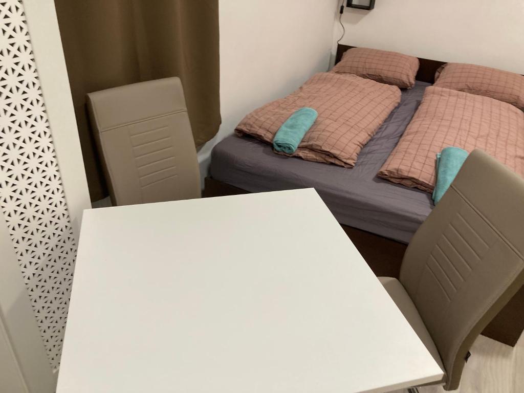 Posteľ alebo postele v izbe v ubytovaní Roland Apartment Downtown - CORVIN