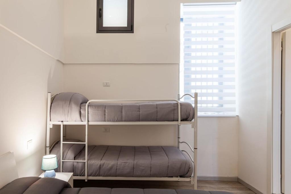 Postel nebo postele na pokoji v ubytování Ragusia