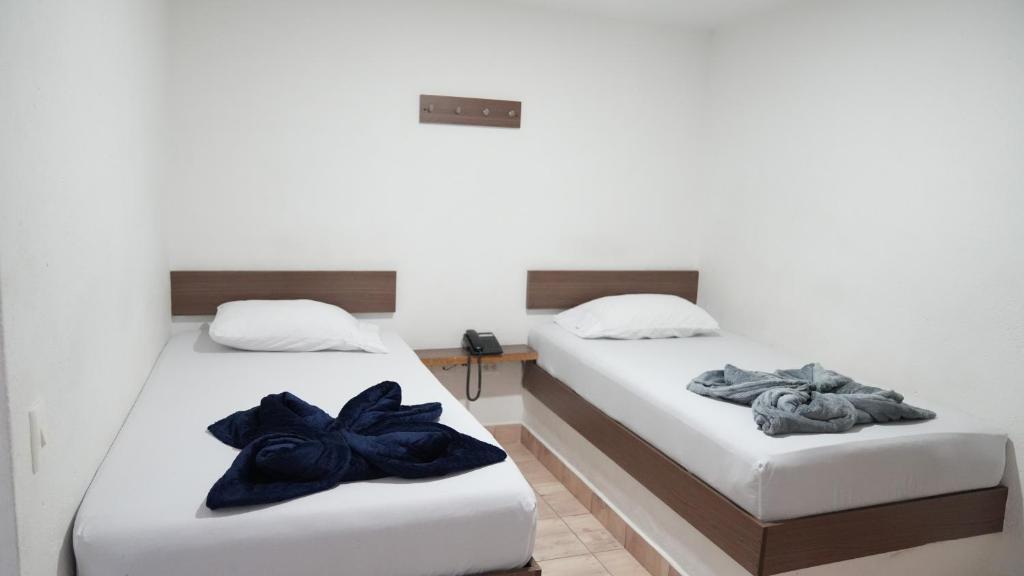 Postel nebo postele na pokoji v ubytování Hotel Salamanca Resort