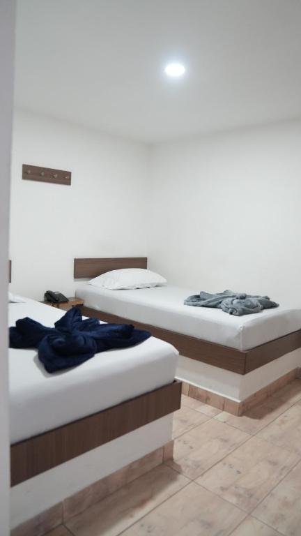 Postel nebo postele na pokoji v ubytování Hotel Salamanca Resort