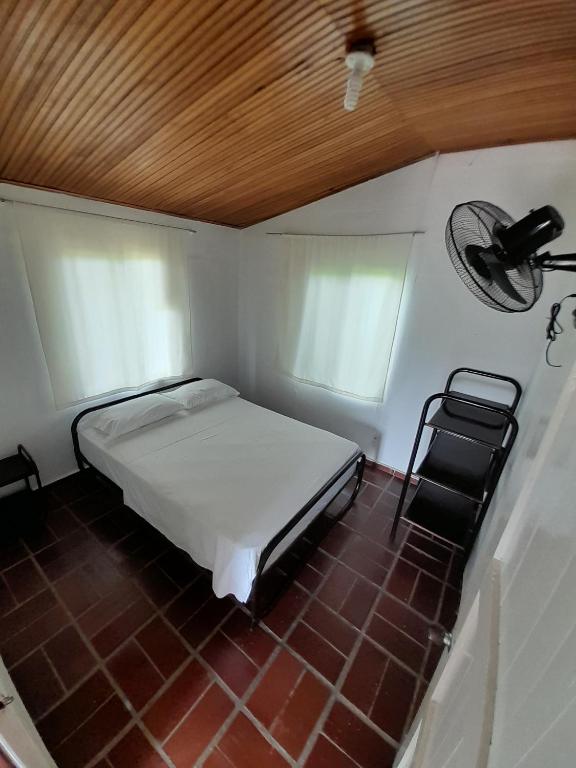 Postel nebo postele na pokoji v ubytování Hotel Campestre CENVATURS