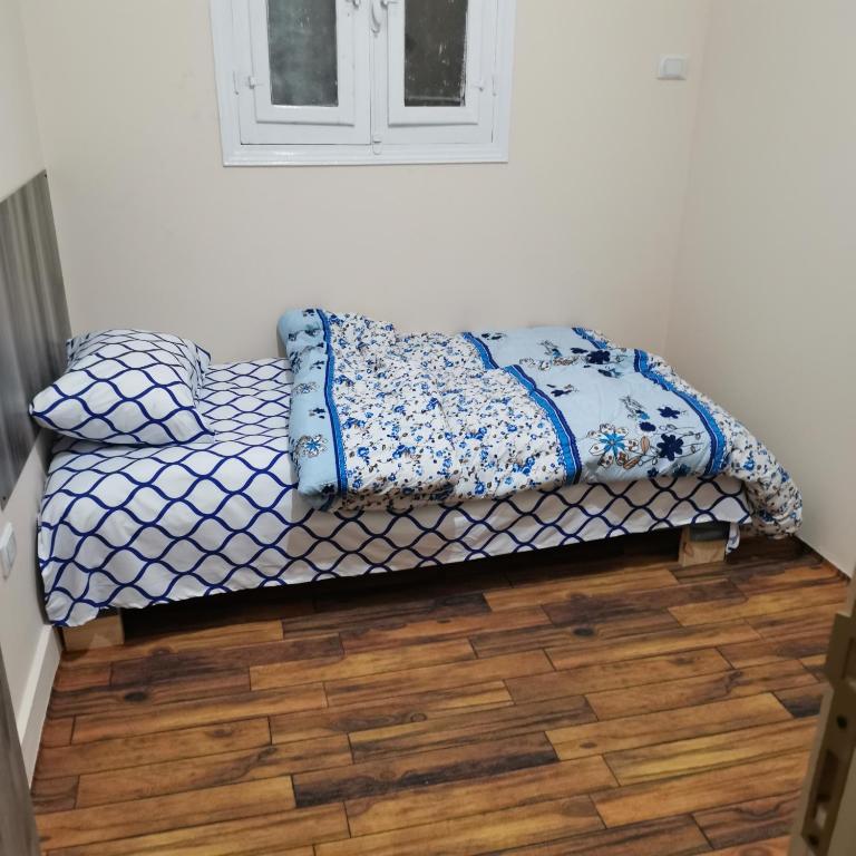 Postel nebo postele na pokoji v ubytování Economy Pyramids Inn